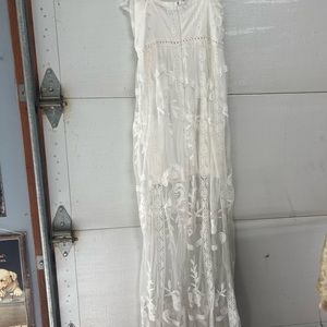 White mini dress with white lace overlay